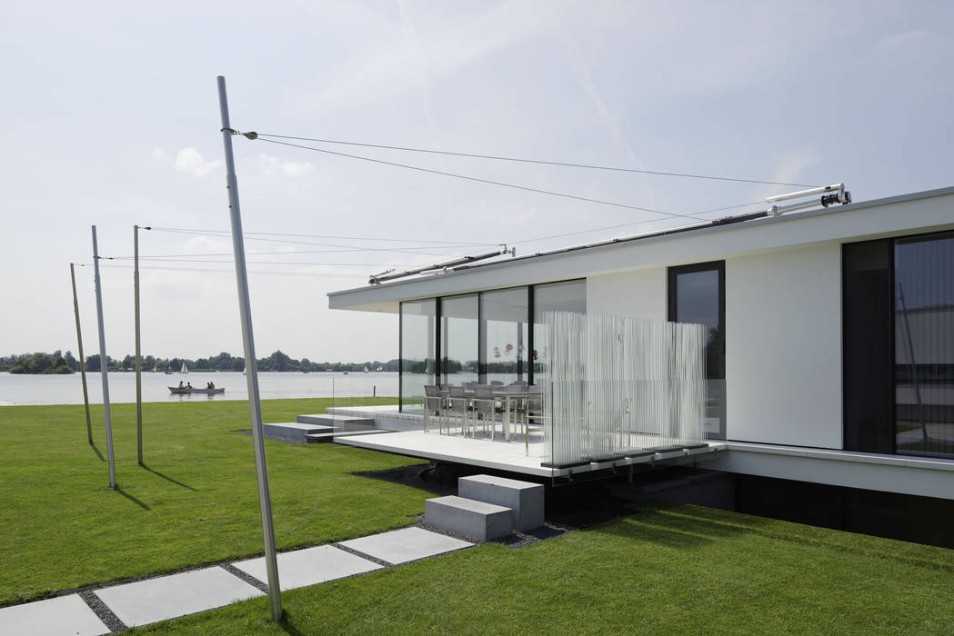 “G-house, villa met gastenverblijf aan de Reeuwijkse Plas” , Lab32 architecten Lab32 architecten Modern houses