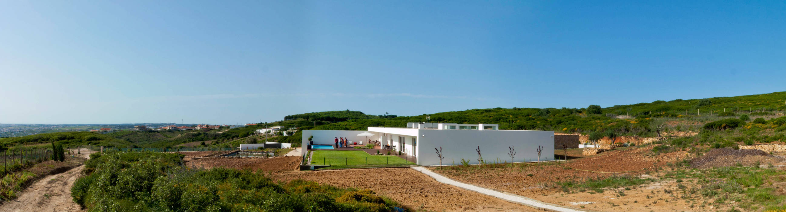 Casas modernas de André Pintão Moderno Piedra