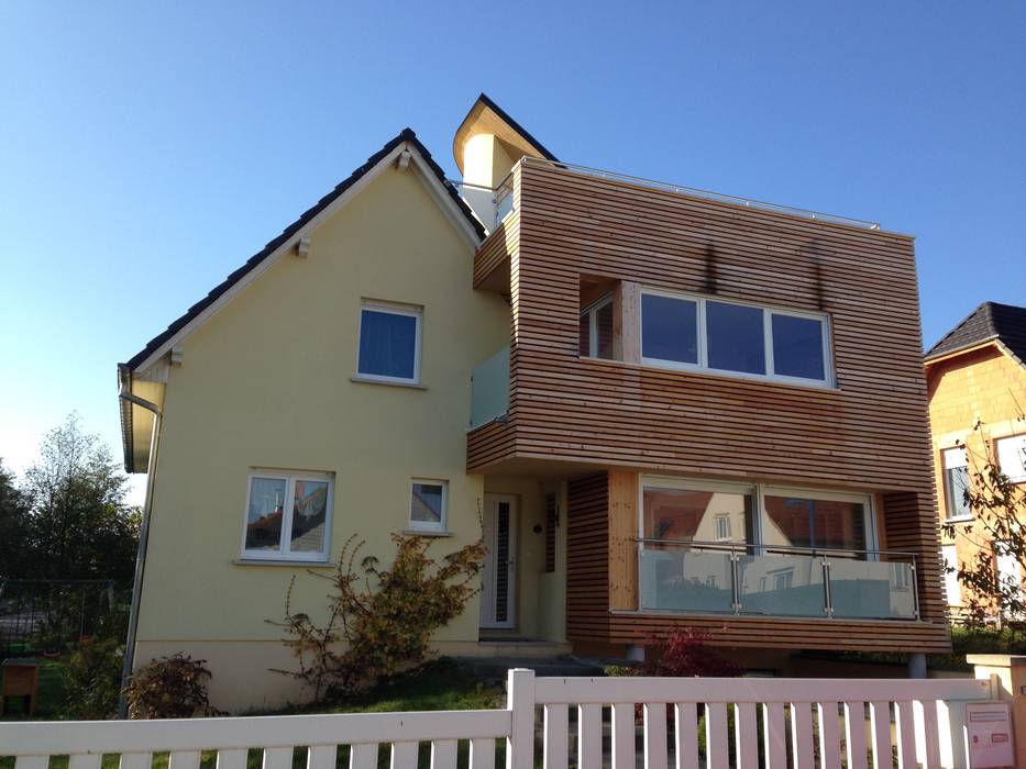 EXTENSION D'UNE MAISON A HAGENTHAL-LE-BAS, A.FUKE-PRIGENT ARCHITECTE A.FUKE-PRIGENT ARCHITECTE Дома в стиле модерн