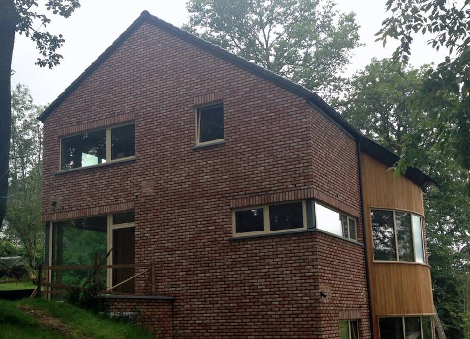 Une maison passive dans les bois, à Céroux-Mousty, Bureau d'Architectes Desmedt Purnelle Bureau d'Architectes Desmedt Purnelle Casas modernas