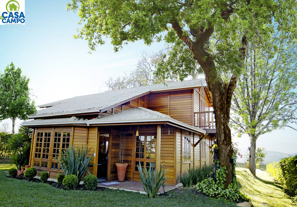 Casas em madeira , CASA & CAMPO - Casas pré-fabricadas em madeiras CASA & CAMPO - Casas pré-fabricadas em madeiras Plantar,Prédio,Céu,Janela,Árvore,Casa,Paisagem natural,Porta,Terreno,Cabana