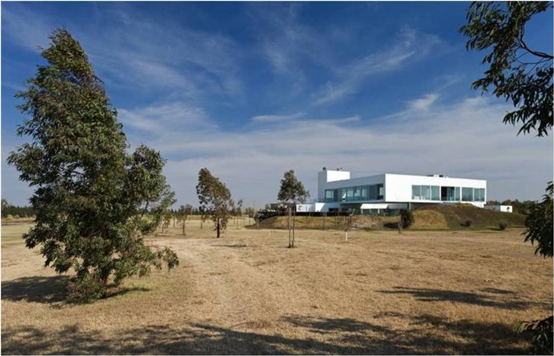 Proyecto Minimalista, Estudio Arquitecta Mariel Suarez Estudio Arquitecta Mariel Suarez Будинки