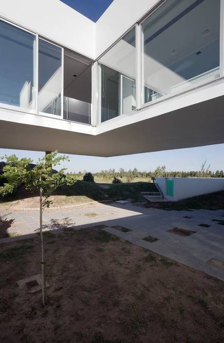 Proyecto Minimalista, Estudio Arquitecta Mariel Suarez Estudio Arquitecta Mariel Suarez Дома в стиле минимализм