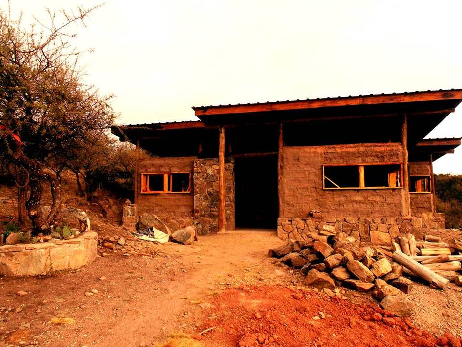 CASA DE LA COLINA bioma arquitectos asociados Casas de estilo rural Madera Acabado en madera