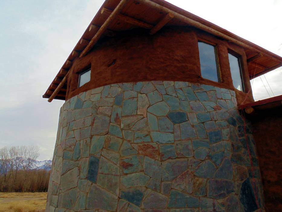 Casa faro bioma arquitectos asociados casas rurales piedra marrón | homify