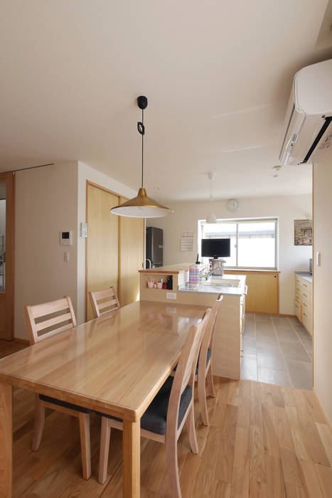 ペニンシュラキッチン: 池田デザイン室（一級建築士事務所）が手掛けた折衷的なです。,オリジナル