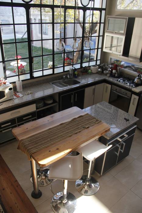 Nowoczesna jadalnia od laura zilinski arquitecta Nowoczesny