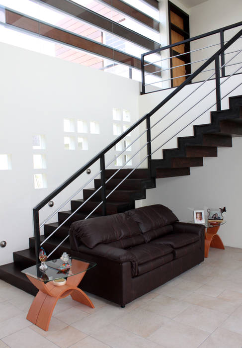Modern corridor, hallway & stairs by Arquimia Arquitectos Modern