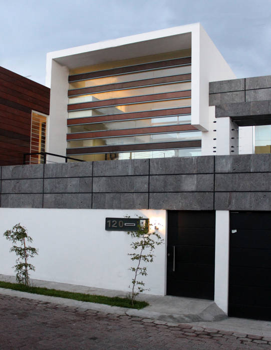 Modern home by Arquimia Arquitectos Modern