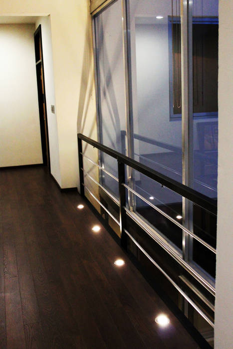 Modern corridor, hallway & stairs by Arquimia Arquitectos Modern