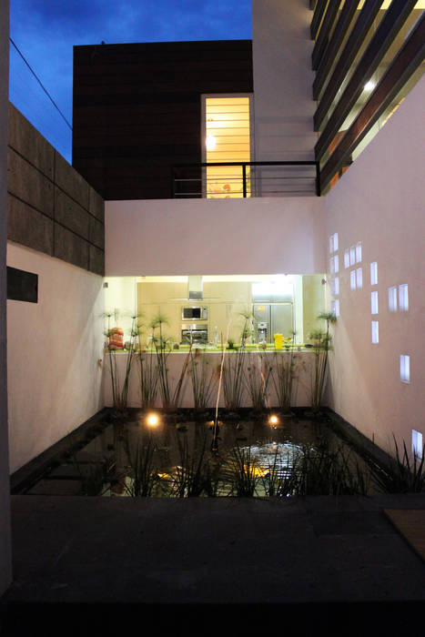 Modern houses by Arquimia Arquitectos Modern