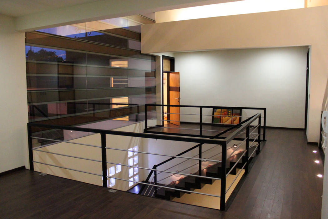 Hành lang, sảnh & cầu thang phong cách hiện đại bởi Arquimia Arquitectos Hiện đại