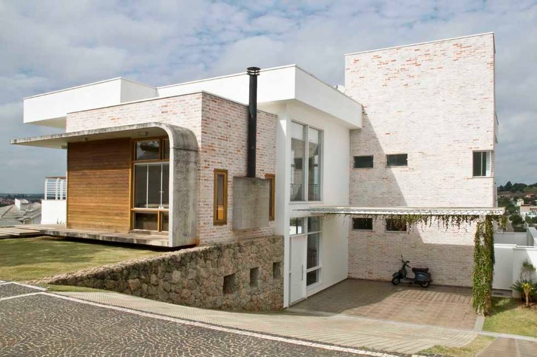 Casa Tatuí, Flavio Vila Nova Arquitetura Flavio Vila Nova Arquitetura Casas estilo moderno: ideas, arquitectura e imágenes