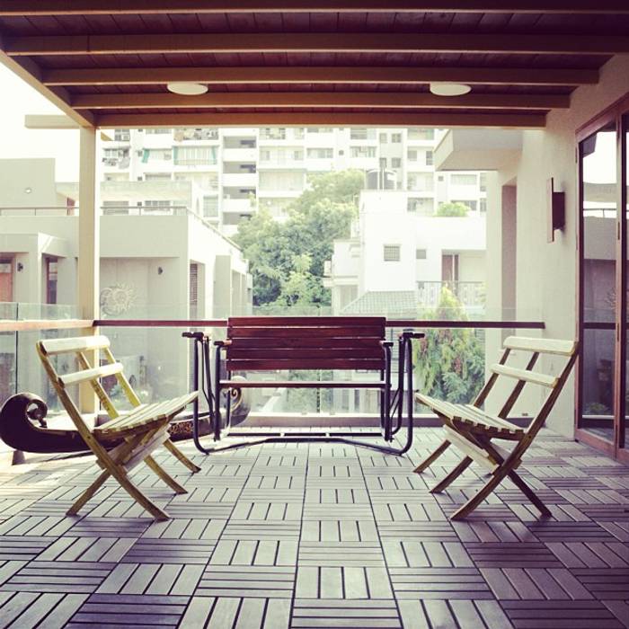 Mr. Harsh Patel Residance, U design studio U design studio Classic style balcony, veranda & terrace Property,Furniture,Plant,Wood,Chair,Shade,Lighting,Rectangle,Interior design,Architecture