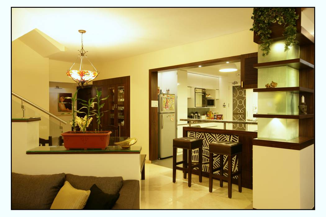 The Breakfast Counter overlooks into the Kitchen Navmiti Designs Modern dining room