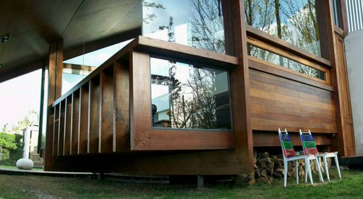 Casa de madera en VILLA ELISA - La Plata, juan olea arquitecto juan olea arquitecto Rustic style house