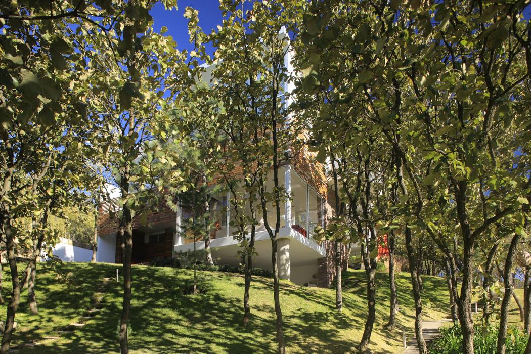 Fachada Casa Azpeytia Echauri Morales Arquitectos Casas de estilo minimalista Cerámico