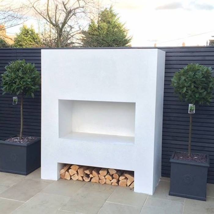A chilly night by the fire IS AND REN STUDIOS LTD Contemporary garden,contemporary fire,firepit,sandstone,woodfire,logs,fireplace,bayleaf,tiled floor,grey fence,garden fence,contemporary fence