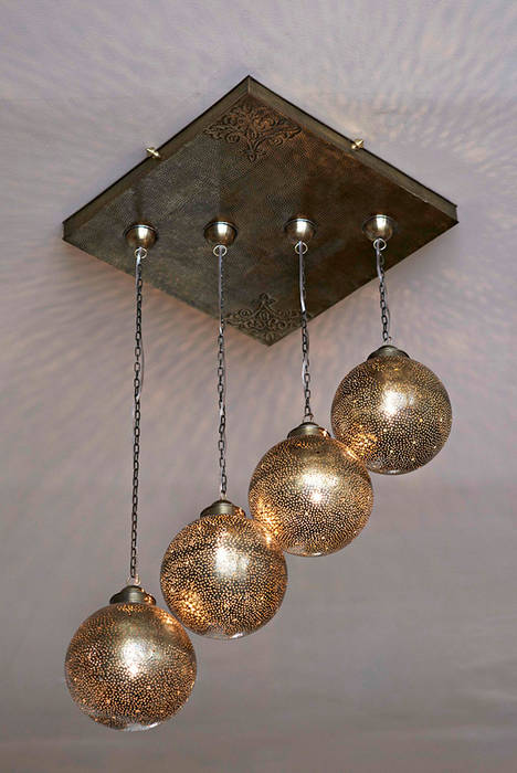 Lámpara colgante en bronce artesanal homify Habitaciones de estilo mediterráneo Cobre/Bronce/Latón Iluminación