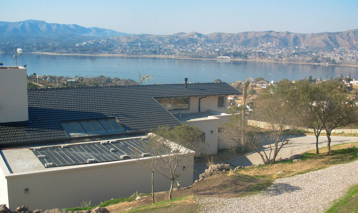 Casa Lago, renziravelo renziravelo Casas de estilo moderno