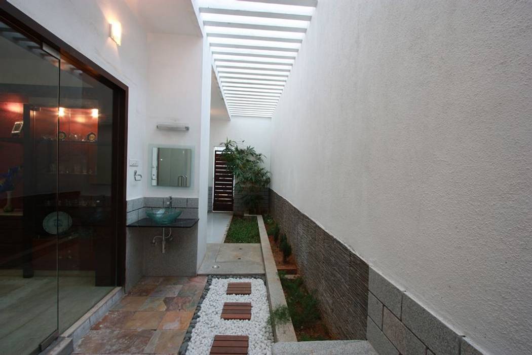 The Passage House, Ansari Architects Ansari Architects Jardines de estilo moderno
