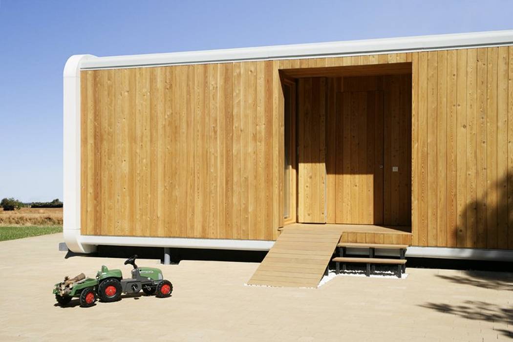 Una Casa de Madera Modular, Ecológica y Prefabricada para recibir a los nietos en verano, NOEM NOEM Modern houses