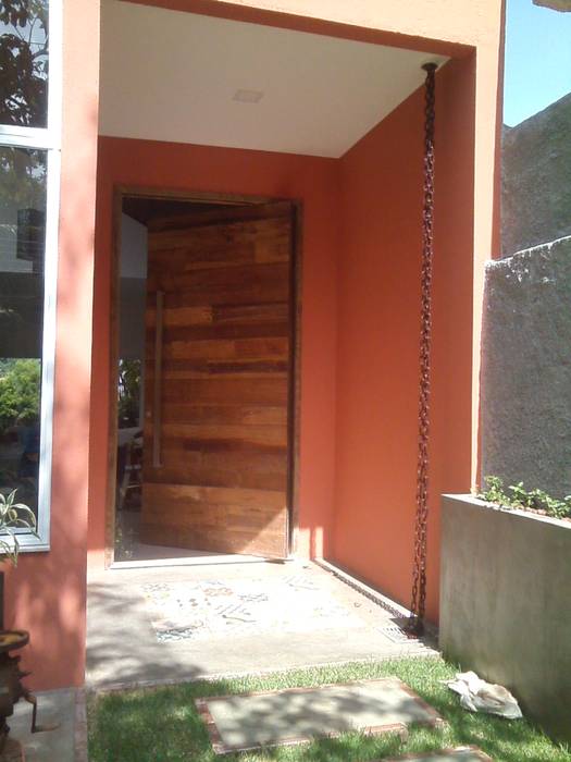 porta pivotante Margareth Salles Portas e janelas modernas