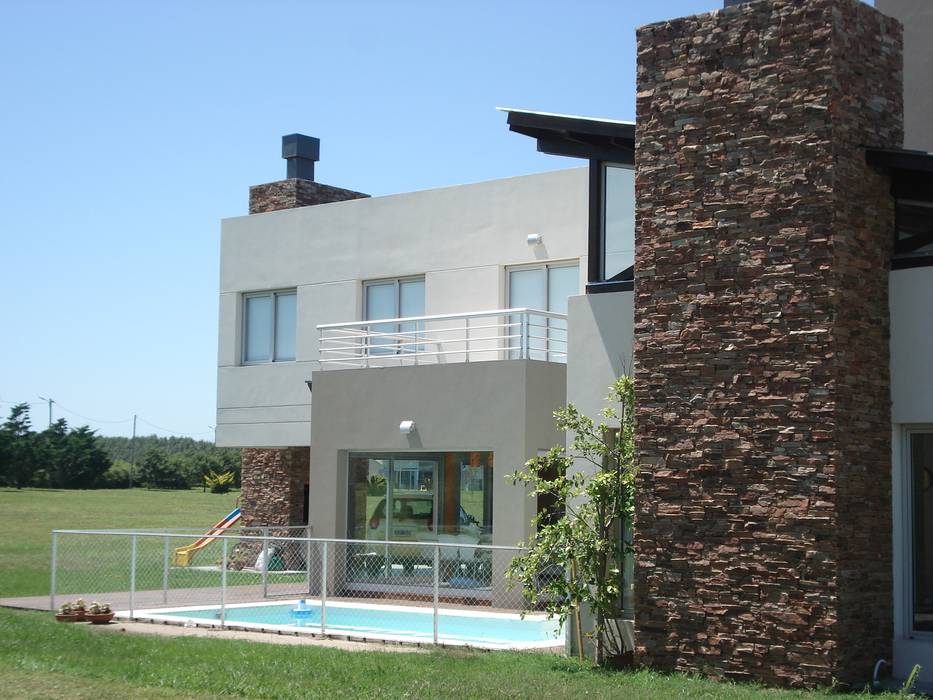 Viviendas Unifamiliares Barrio Privado Rumencó - Mar del Plata, Estudio Arquitectura Integral Estudio Arquitectura Integral Maisons modernes