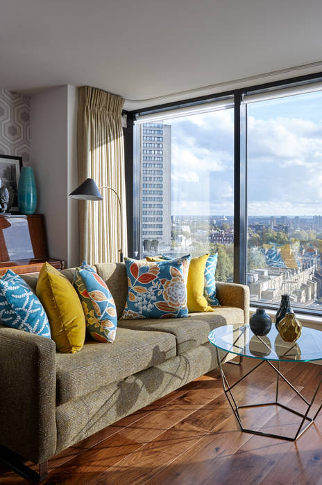 Gloucester Road Penthouse Bhavin Taylor Design غرفة المعيشة Living room,sofa,cushions,floor lamp,coffee table,piano,pattern,mustard,teal,vases,view,curtains