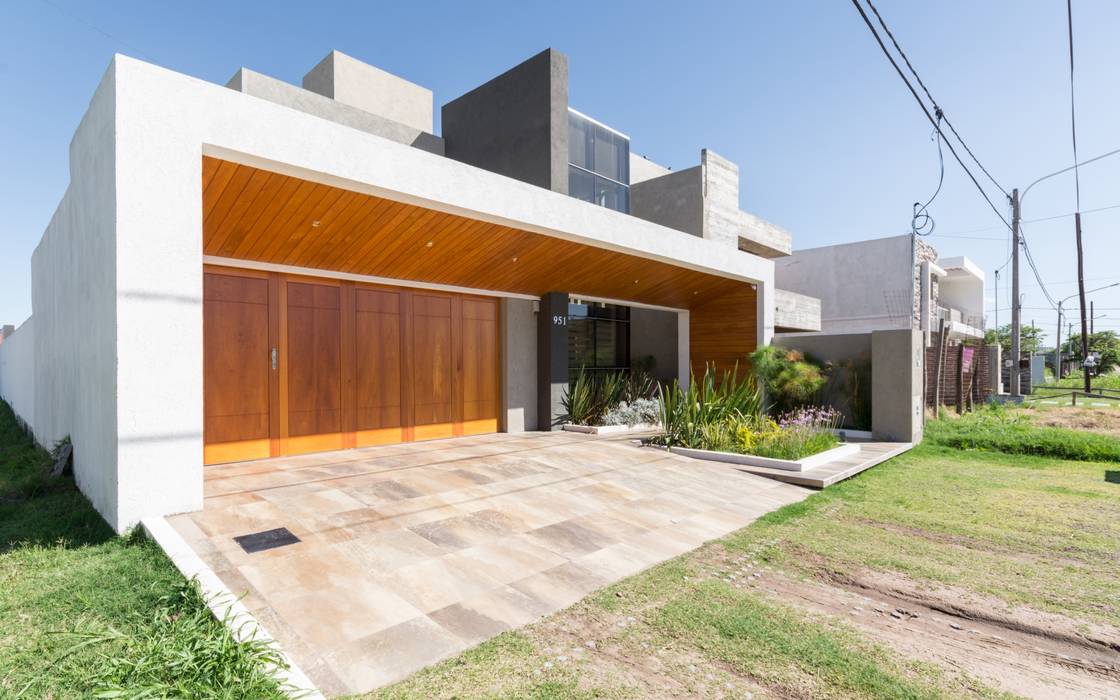 CASA MJ, KARLEN + CLEMENTE ARQUITECTOS KARLEN + CLEMENTE ARQUITECTOS Casas modernas Madera Acabado en madera