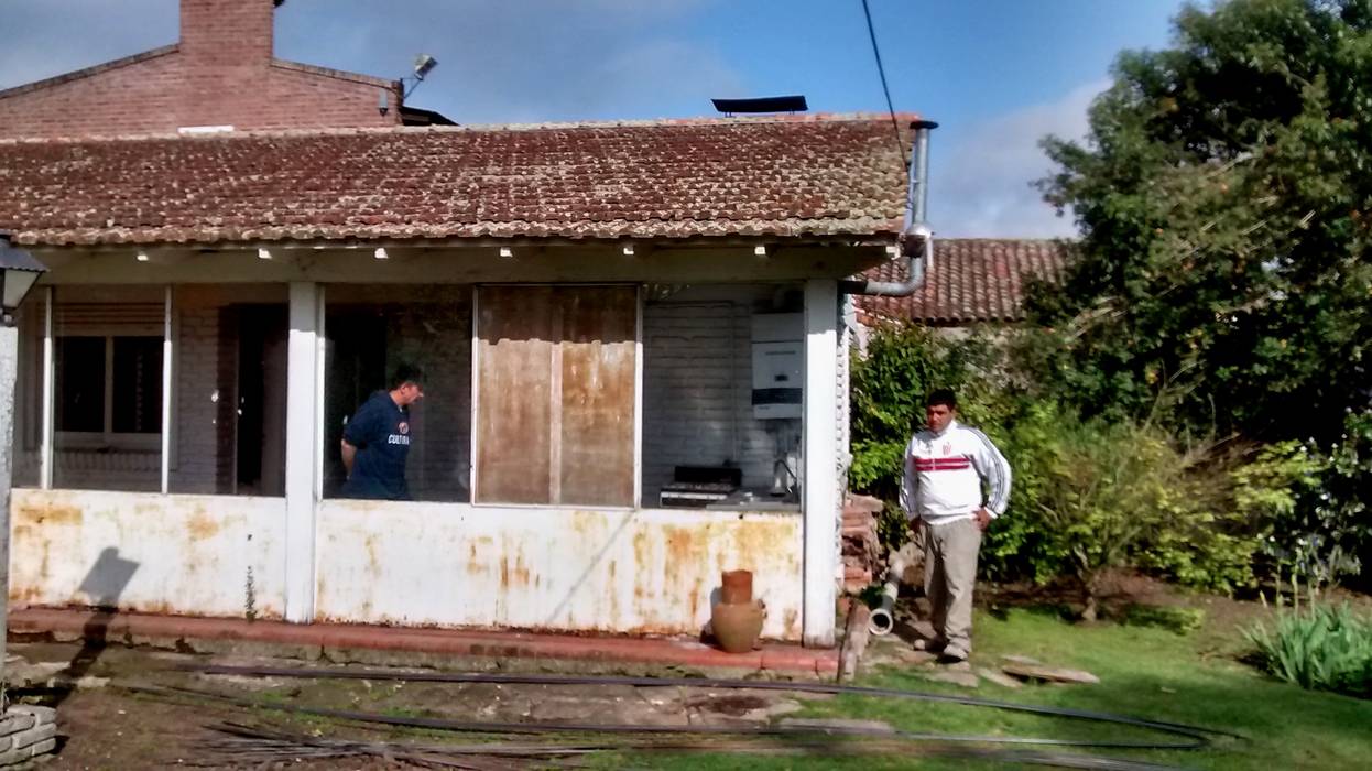 Remodelación y ampliación , Estudio ZP Estudio ZP Casas coloniais Cobre/Bronze/Latão