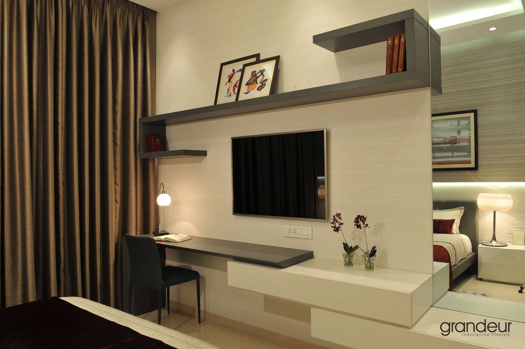 Wall system with desk. Grandeur Interiors Modern style bedroom Bedside tables