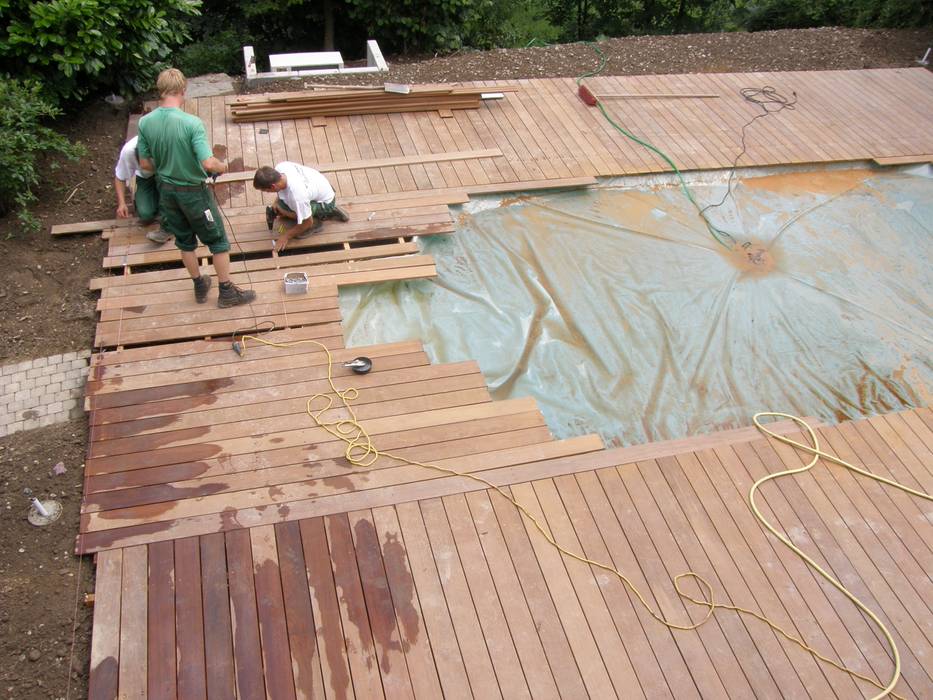 Einbau eines Stahlwandpools, Hesselbach GmbH Hesselbach GmbH Vườn phong cách Địa Trung Hải