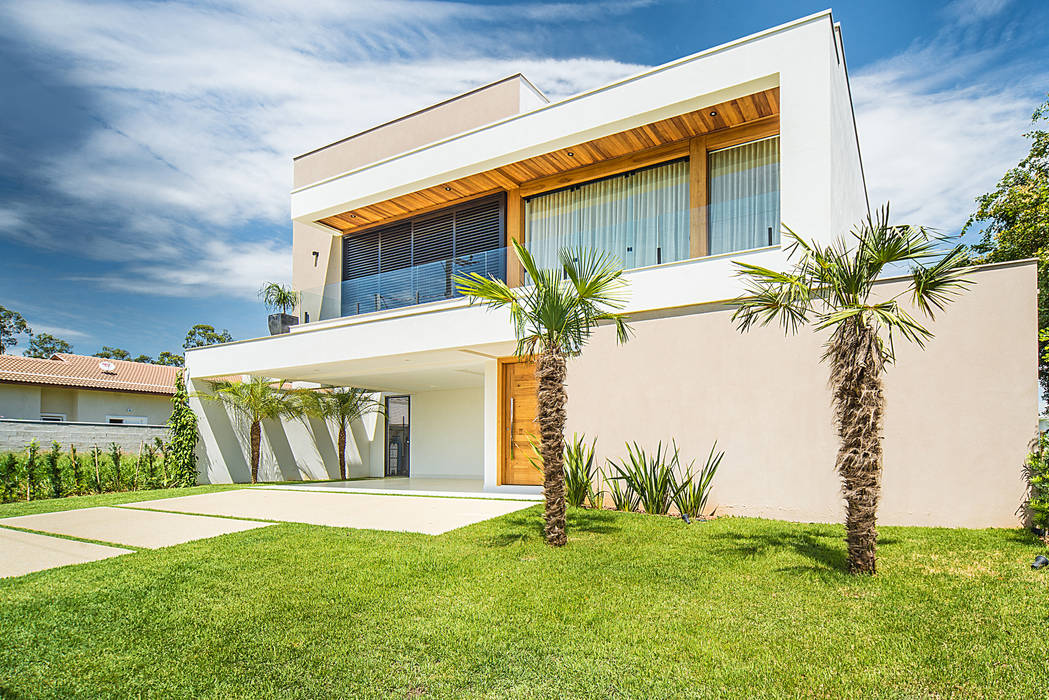 MODERNA EM LINHAS RETA, Camila Castilho - Arquitetura e Interiores Camila Castilho - Arquitetura e Interiores Modern Houses