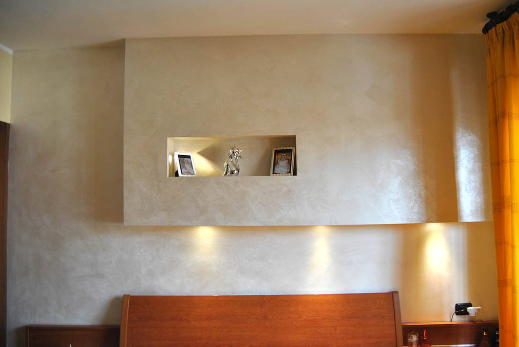 camera da letto con pannello decorativo