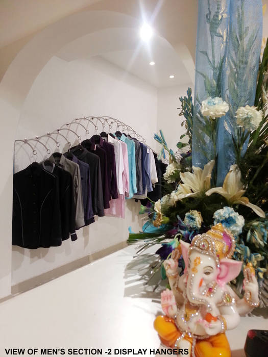 TURQUOISE -designer clothes showroom, Ingenious Ingenious Minimalist walls & floors