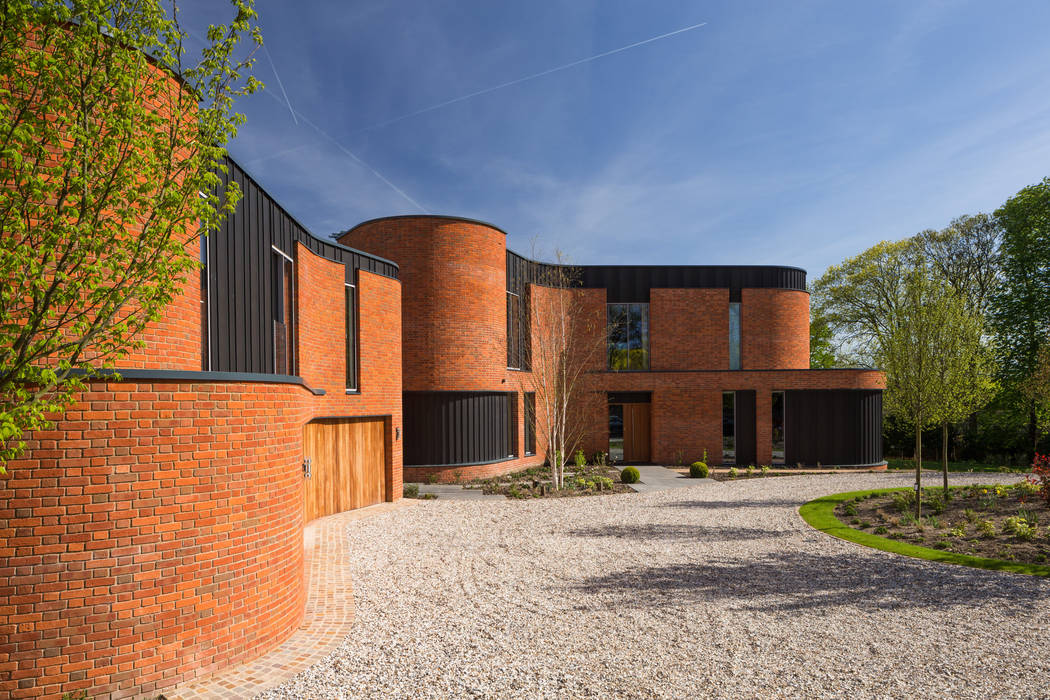 Incurvo, Adrian James Architects Adrian James Architects Casas modernas Ladrillos curves,curved,brick,zinc,light,bright,modern