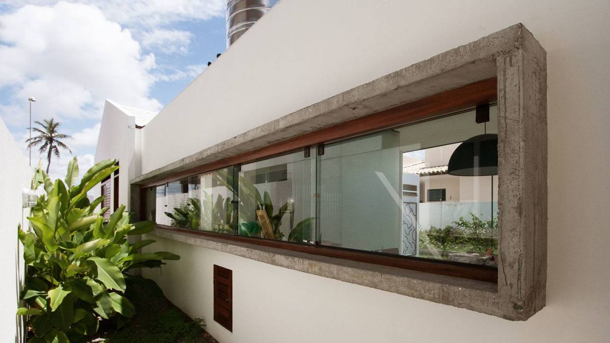 RESIDÊNCIA PÁTIO ARUANA, Coletivo de Arquitetos Coletivo de Arquitetos Minimalist houses