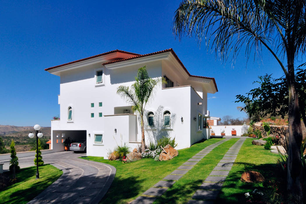 residencia Caballero, Excelencia en Diseño Excelencia en Diseño Casas coloniais Tijolo