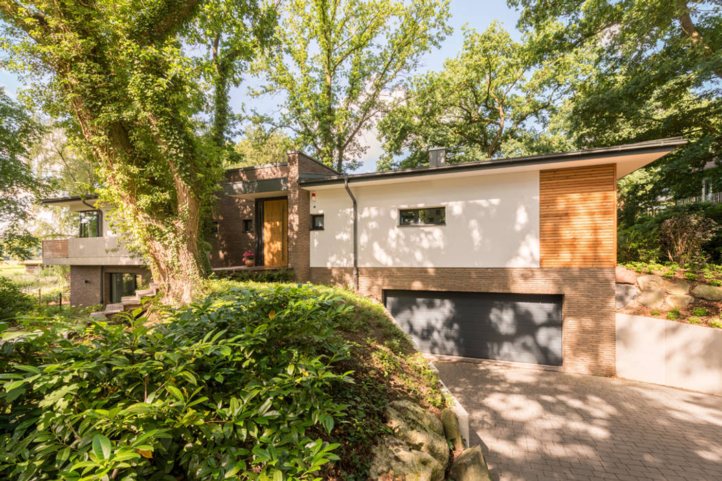 Einfamilienhaus TW12, Hellmers P2 | Architektur & Projekte Hellmers P2 | Architektur & Projekte Garage/Rimessa in stile moderno Legno Effetto legno