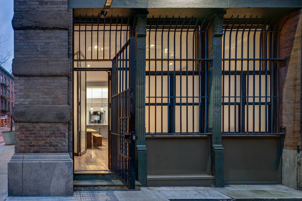 Exterior of Duplex At Street Entry Level Lilian H. Weinreich Architects Industrial style houses Bricks