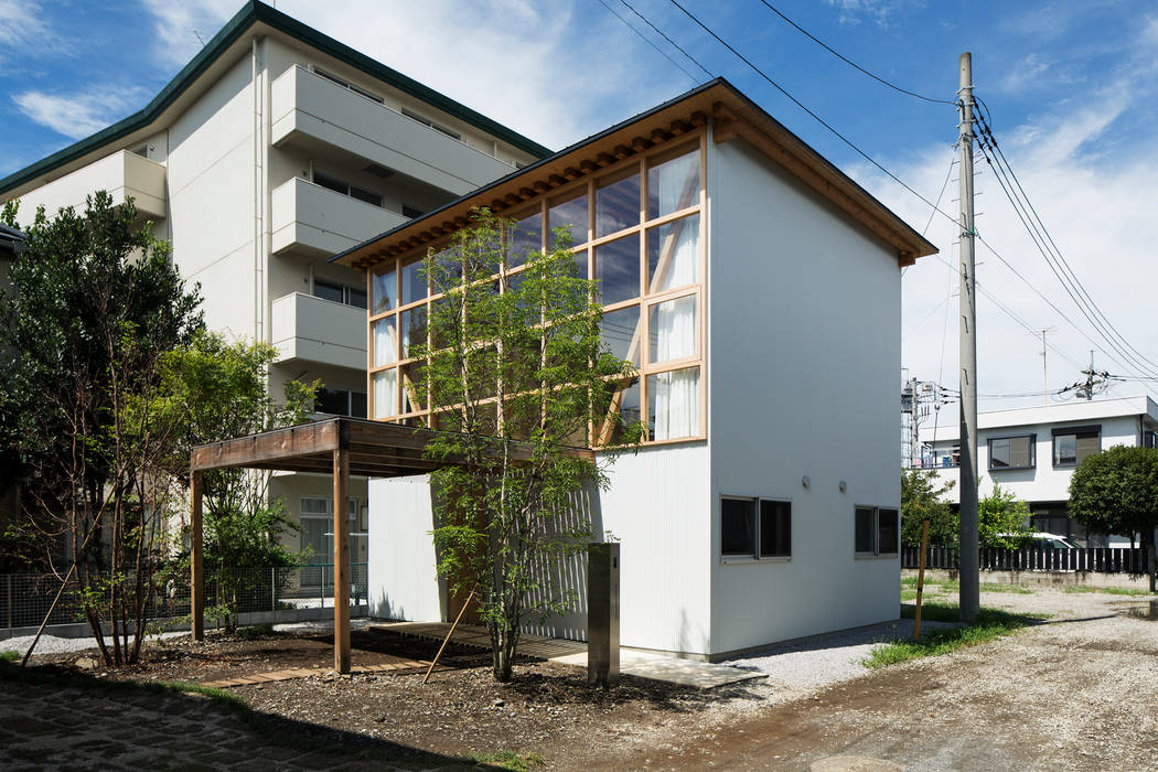 module grid house, 山路哲生建築設計事務所 山路哲生建築設計事務所 에클레틱 주택 금속