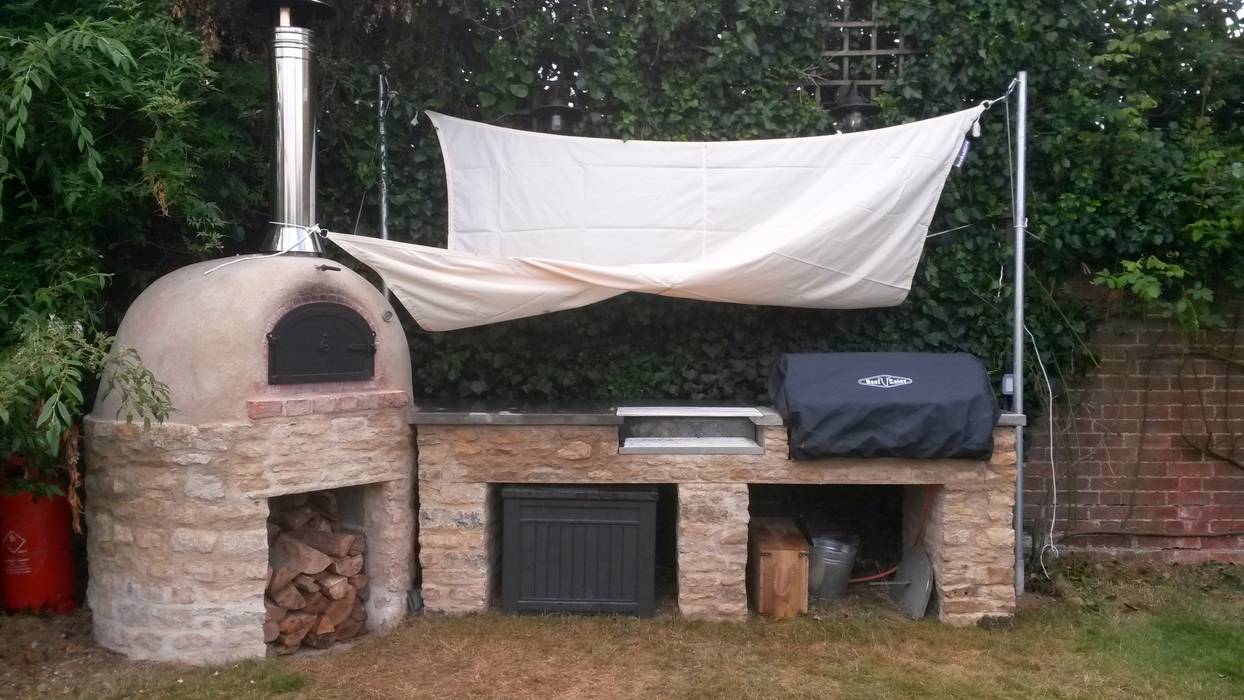 outdoor cooking area wood-fired oven Jardines rústicos outdoor kitchen,pizza oven,bbq