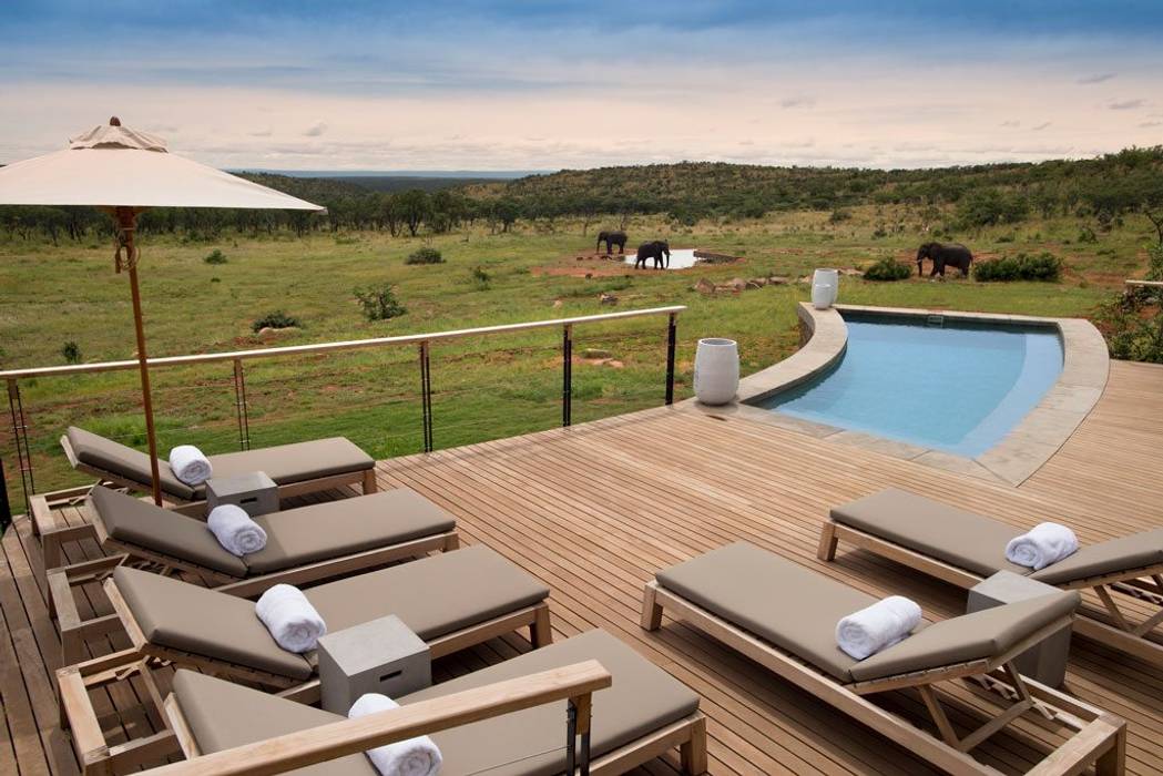 Mhondoro, een Lodge in Zuid-Afrika, All-In Living All-In Living Moderne Pools