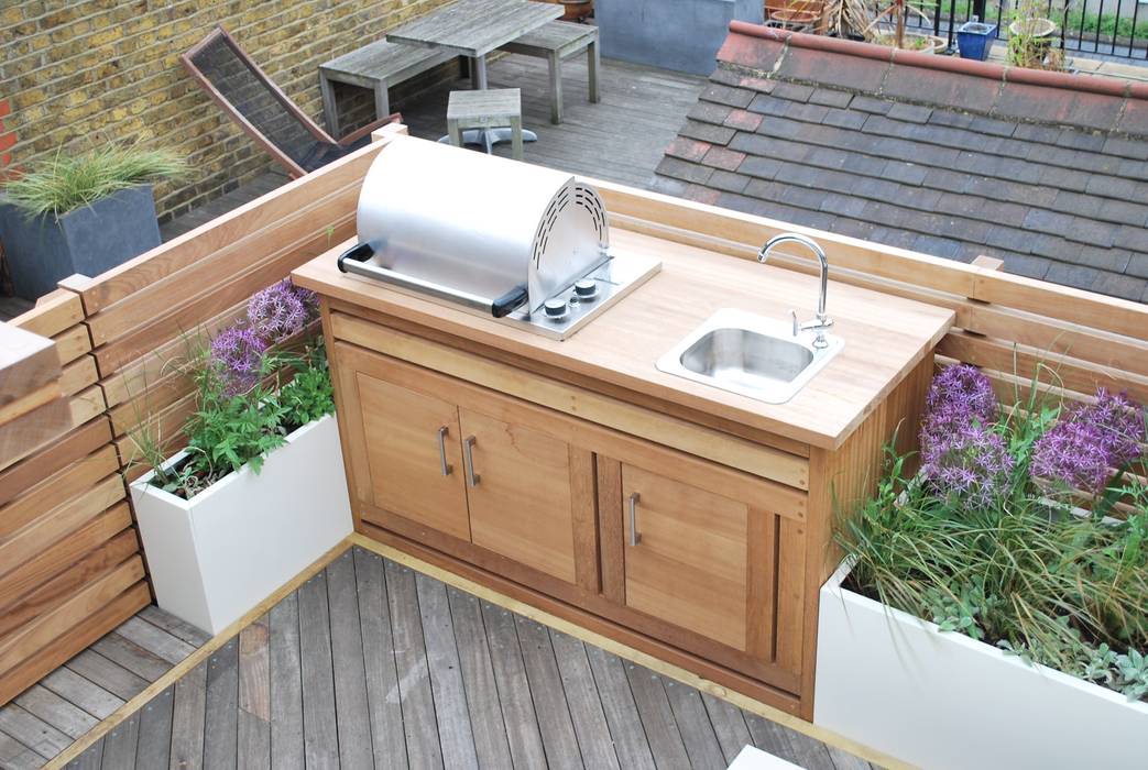 Searles Road Aralia Modern Garden Wood Wood effect roof terrace,london roof terrace,contemporary roof terrace,rooftop garden,balcony,london rooftop garden,contemporary roof terrace,contemporary garden design,contemporary design,design,outdoor BBQ,outdoor kitchen,outdoor sofa