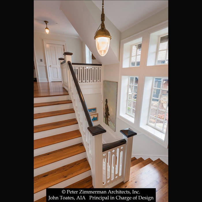 Main Stair John Toates Architecture and Design Classic style corridor, hallway and stairs interior,stair,stair hall,wood flooring,railing,window,transom