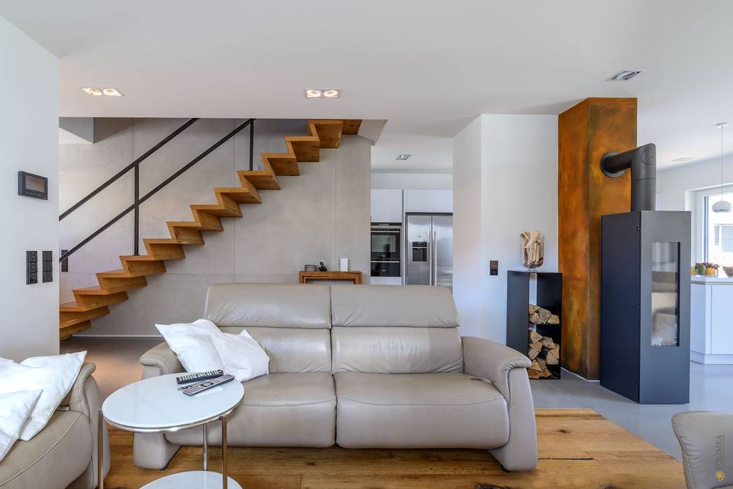 Modernes wohnzimmer mit akzentwand im betonlook industriale wohnzimmer