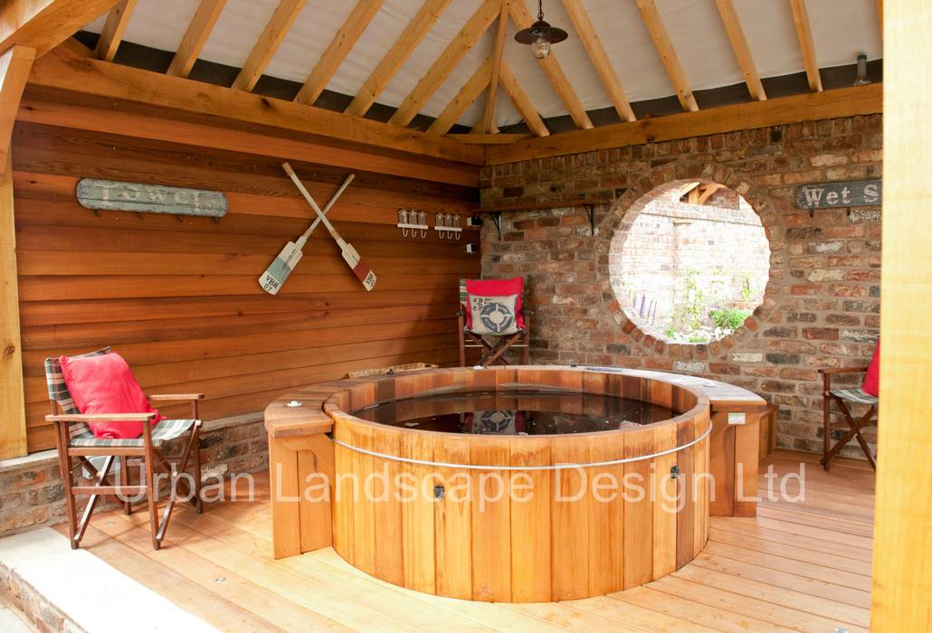 Outdoor hot tub area & oak building homify