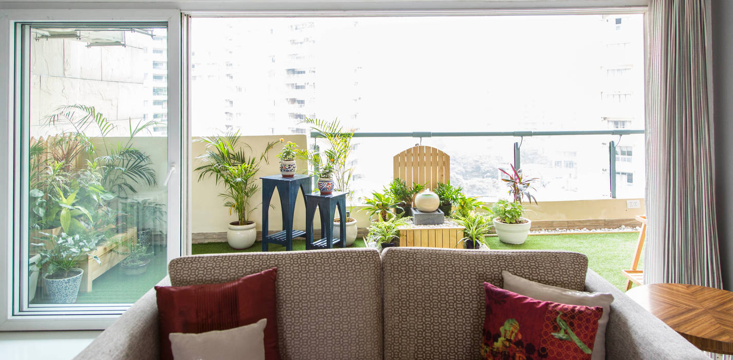 Wide view of the Balcony from inside the living room. Studio Earthbox Eclectic style living room