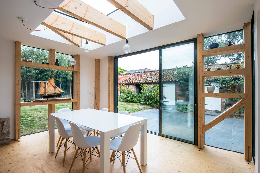 dining room homify Modern dining room Engineered Wood Transparent glulam,extension,dining room,glass,sliding doors,skylight,timber frame,exposed frame,beams,plywood,suffolk,architecture